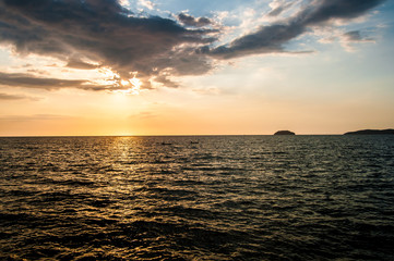 Kayaking Into The Sunset With Two Islands In Sight