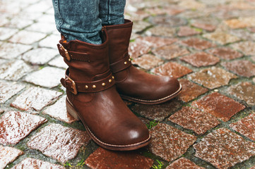 New brown leather boots on child's feet