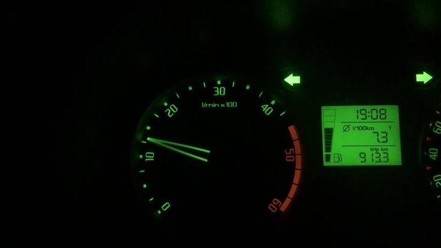High speed emergency lights. Speedometer, tachometer sports car. Cyclometer. Car instrument panel, showing rpm and high speed acceleration. 4K.