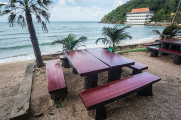 Empty stone table and benchs at Laem saded beach, Chanthaburi, Thailand.