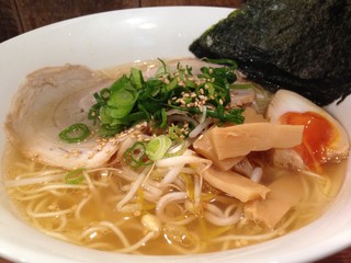 Ramen Japanese noodle with clear salty soup and roast pork melt egg