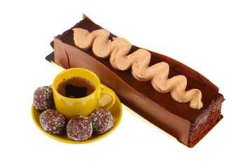 chocolate cake with cup of coffee and chocolate balls, isolated