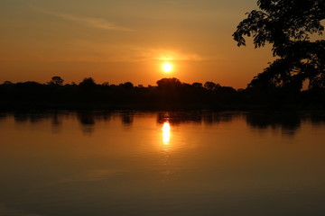 Fototapeta na wymiar Sun is going up at the Caprivi Strip of Namibia, Africa
