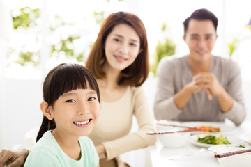 happy asian young Family enjoy their dinner
