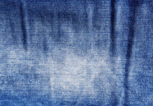 Blue worn jeans texture.