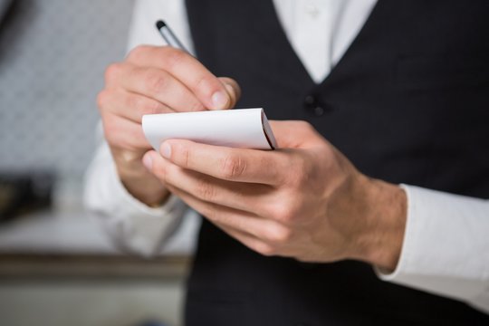 Bartender taking an order - Powered by Adobe