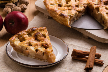 apple pie slice on rustic setting