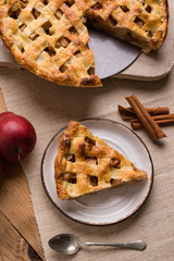 apple pie slice on rustic setting