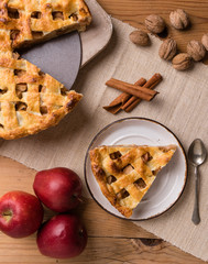 apple pie slice on rustic setting