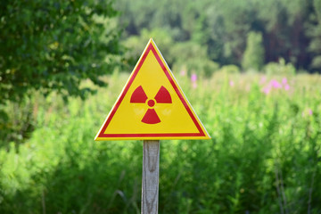 Triangular sign of radiation hazard in the zone of radioactive fallout