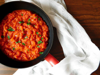 Asian tomato sauce with shrimps in a pan 
