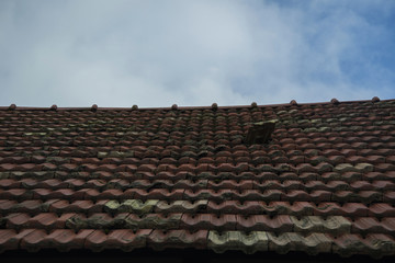 replacing roof tiles on old roof
