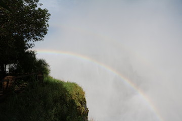 Rainbows in front of Victoria Falls, Zambia, Africa