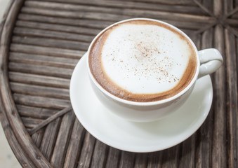 Fototapeta na wymiar cappuccino coffee on table