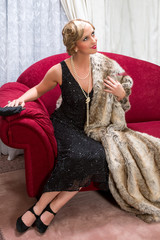 Vintage woman on chaise-longue