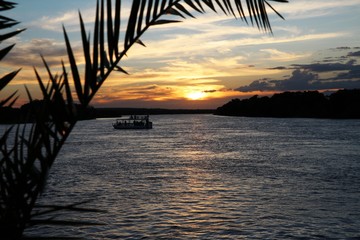 Romantic sunset at Sambesi River in Zambia, Africa 