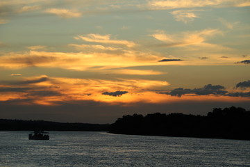 View from ship to sunset at the Sambesi River, Zambia Africa