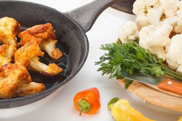 Cooking - Frying cauliflowers in the pan