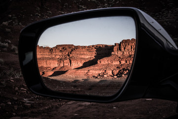 Rocks in the cars side mirror