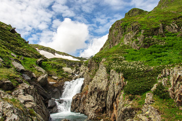 Fototapeta na wymiar Summer mountain landscape with river and waterfall