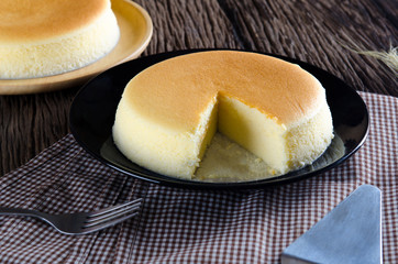 Cheese cake on dark tone.