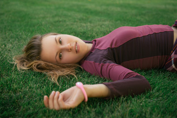 Active woman wearing fitness tracker