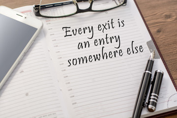 Fototapeta premium Blank in a notebook (the diary) and a mobile phone, glasses, fou