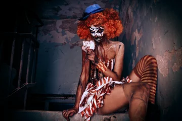 Fotobehang sexy zombie clown © Andrey Kiselev
