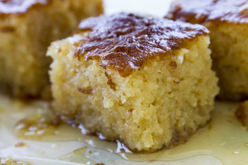 Turkish traditional dessert Revani cut in pieces.