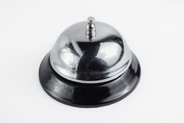 Hotel bell closeup on a white background