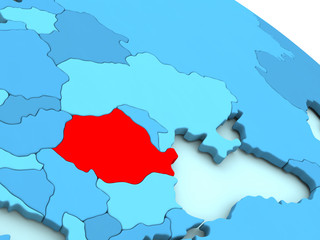 Fototapeta premium Romania in red on blue globe