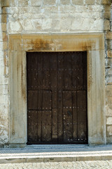 Fototapeta na wymiar door of a Renaissance palace in the town of Alcantara, Caceres, Extremadura, Spain