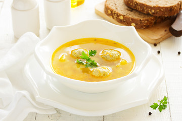 Homemade soup with chicken meatballs.