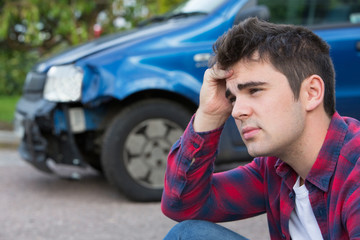 Unhappy Driver With Damaged Car After Accident