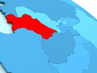 Fototapeta premium Turkmenistan in red on blue globe