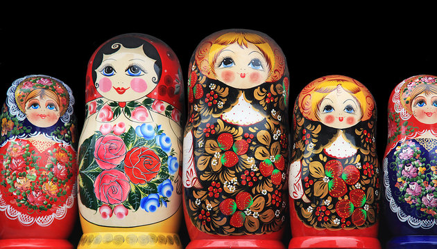 Wooden dolls standing in a row