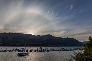 22 degree ice halo over lake wanaka in new zealand