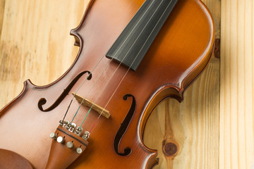 Violin on wooden background