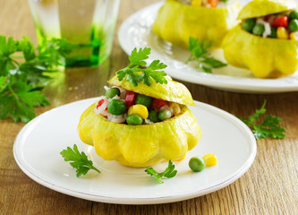 Small scallops stuffed with rice and vegetables. Selective focus.