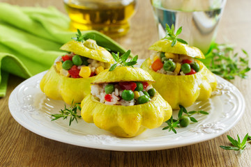 Small scallops stuffed with rice and vegetables. Selective focus.
