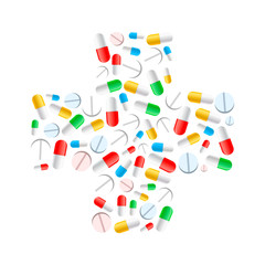 Colourful pills in cross shape isolated on white