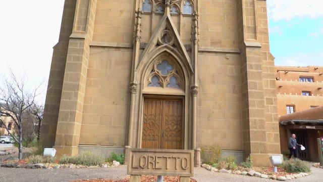 Tracking Shot of Loretto Chapel Exterior in Santa Fe, New Mexico -Tilt Up-