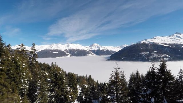 Aerial shot of ski resort of Thyon, the Grand Dixence dam, and the mt Blanc de Cheilon in the southern swiss alps above Sion.