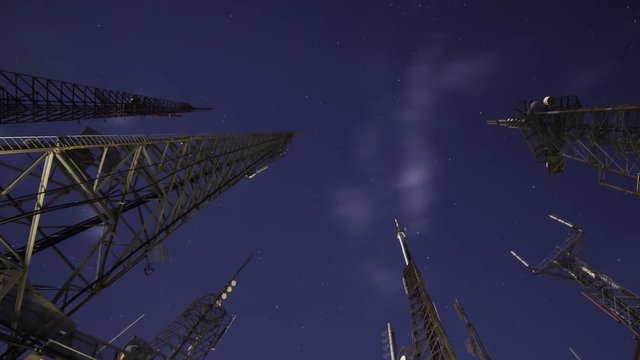 Time Lapse of broadcast radio tower at night shot through storm clouds at Mt. Wilson, California -Long Shot-