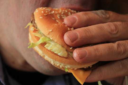 Man eating a hamburger