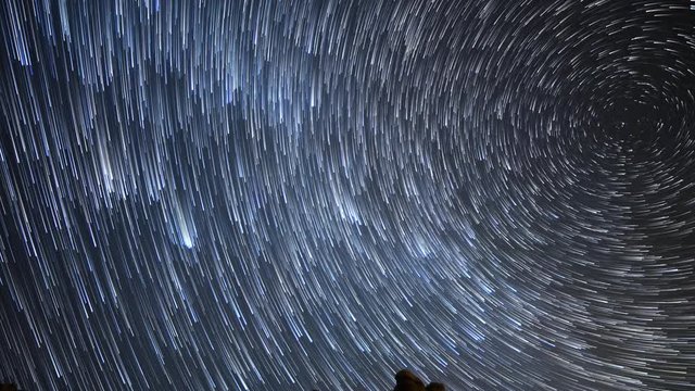 Astro Time Lapse of Meteorite Burst & Star Trails over Desert Rock -Zoom In-