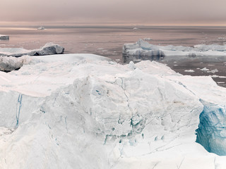 Icebergs on arctic ocean in Ilulissat icefjord, Greenland