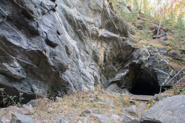 Fototapeta na wymiar Cave in the rock in the Ural mountains
