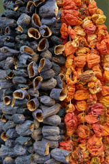 Dried aubergine and red pepper at the bazaar. Dry eggplants are popular ingredient