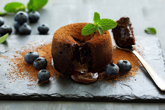 Fondant- delicious chocolate dessert with blueberries.